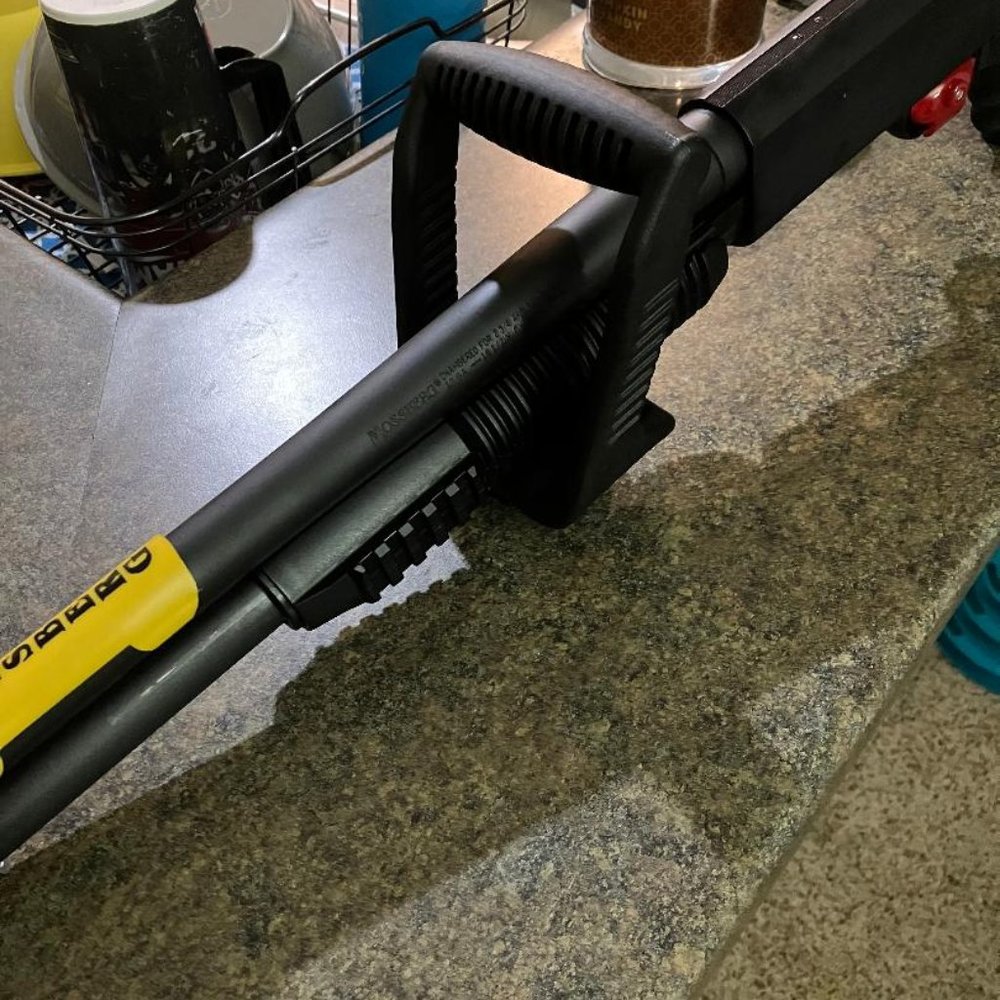 Shotgun Chainsaw grip attachment